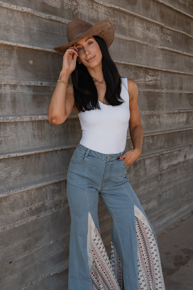 The Essential White Bodysuit